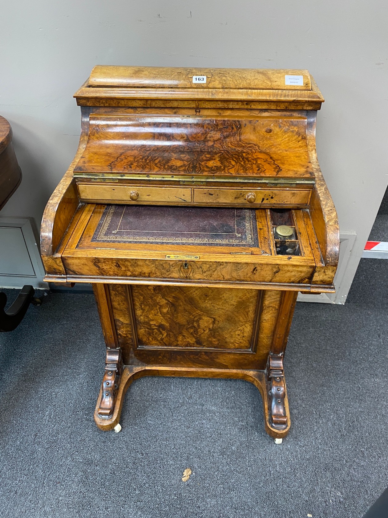 A Victorian burr walnut pop-up piano front davenport, width 57cm, depth 56cm, height 87cm